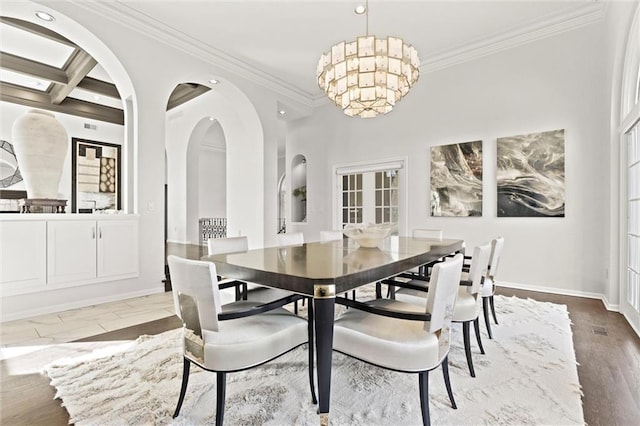 4101 W 123rd St, Leawood, KS 66209 - dining area featuring ornamental molding, recessed lighting, a chandelier, and arched walkways