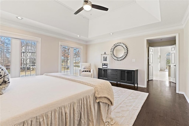 4101 W 123rd St, Leawood, KS 66209 - bedroom with a raised ceiling, multiple windows, crown molding, dark wood-style flooring, and recessed lighting