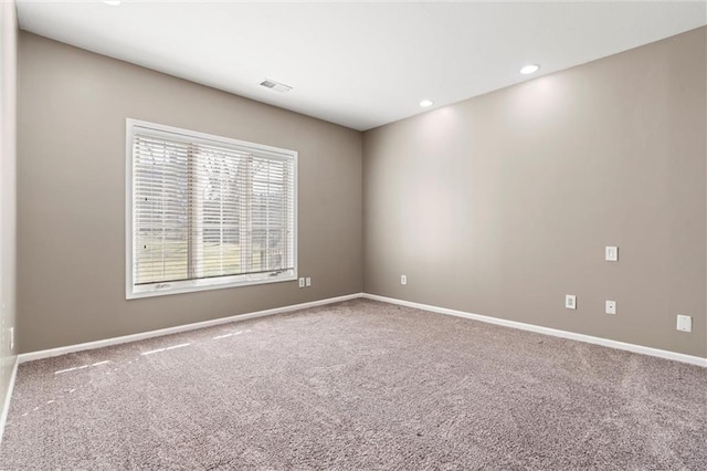 4101 W 123rd St, Leawood, KS 66209 - carpeted spare room featuring baseboards and recessed lighting
