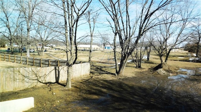 view of yard with fence