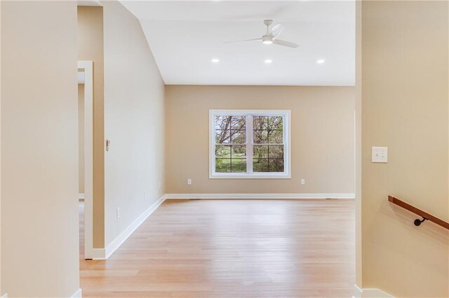 1013 S Main St, Holden, MO 64040 - unfurnished room featuring a ceiling fan, baseboards, and light wood-style floors