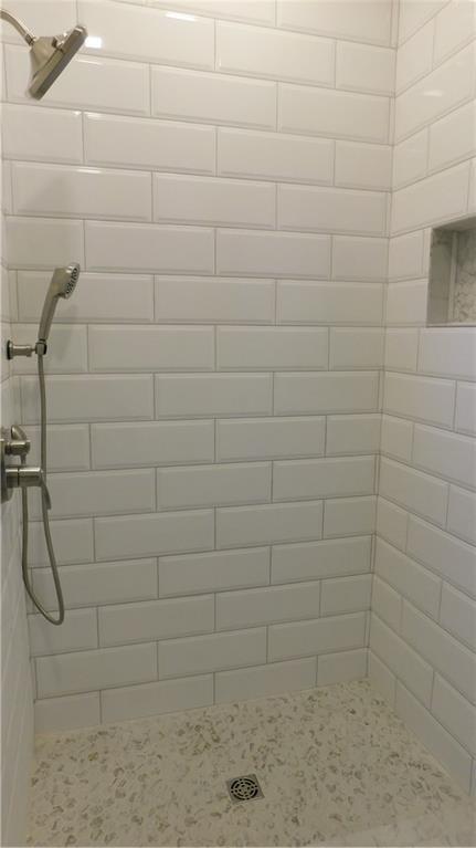 1013 S Main St, Holden, MO 64040 - full bathroom with a stall shower