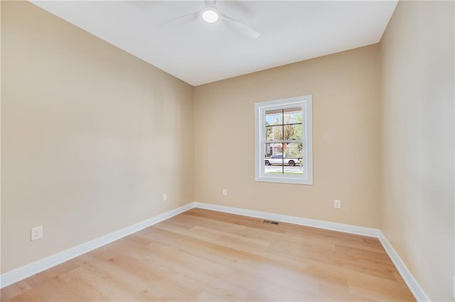 1013 S Main St, Holden, MO 64040 - empty room with ceiling fan, baseboards, visible vents, and light wood finished floors