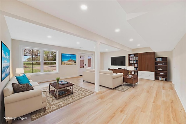 1013 S Main St, Holden, MO 64040 - living area featuring light wood-type flooring, recessed lighting, and ornate columns