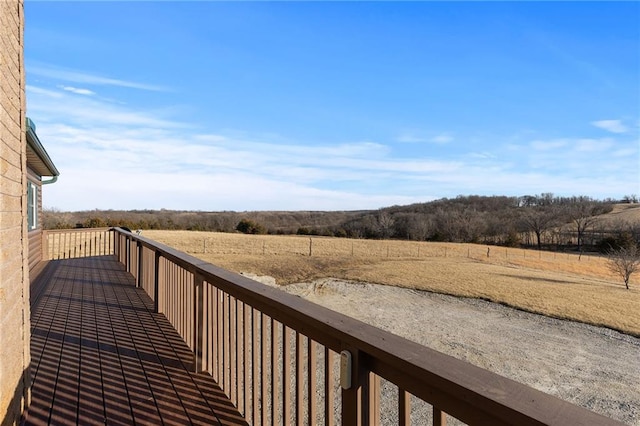 balcony featuring a rural view