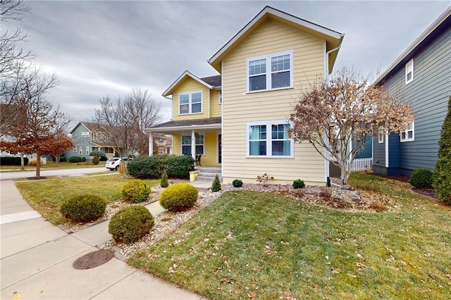 view of front of house featuring a front lawn