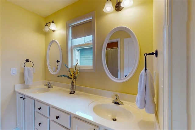 bathroom with double vanity and a sink