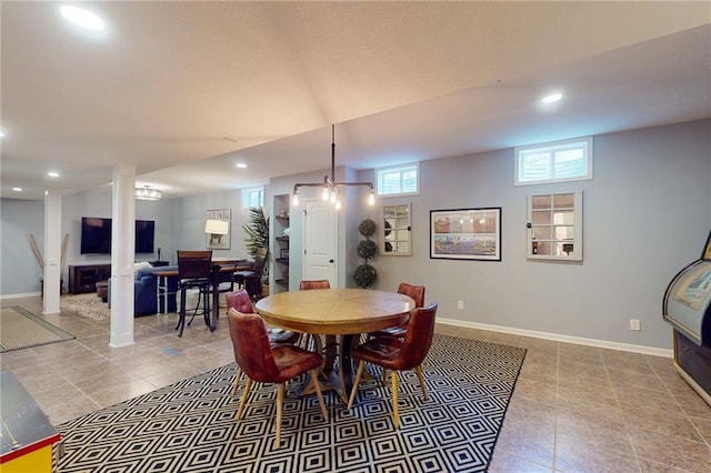 dining room with recessed lighting, light tile patterned flooring, and baseboards