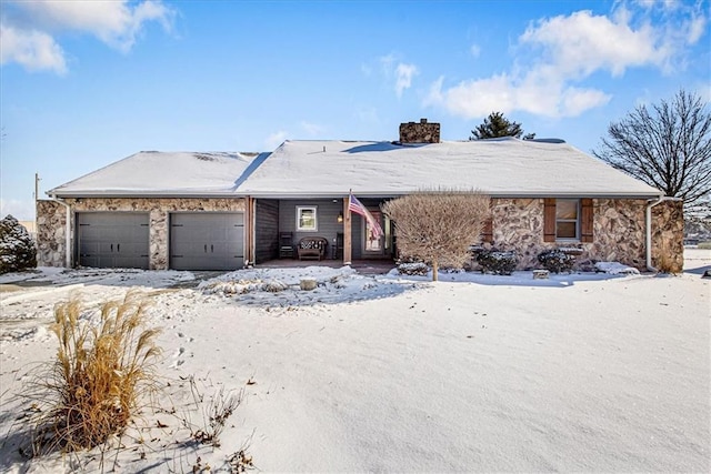 single story home featuring a garage