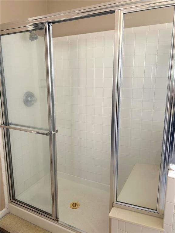 full bathroom with a stall shower