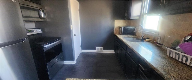 kitchen with stainless steel appliances and sink