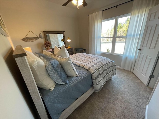 bedroom featuring ceiling fan and carpet flooring