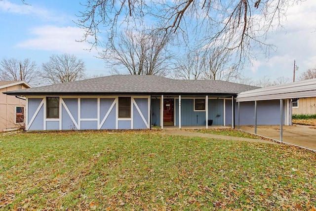 ranch-style home featuring a front yard