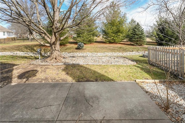 view of yard with fence