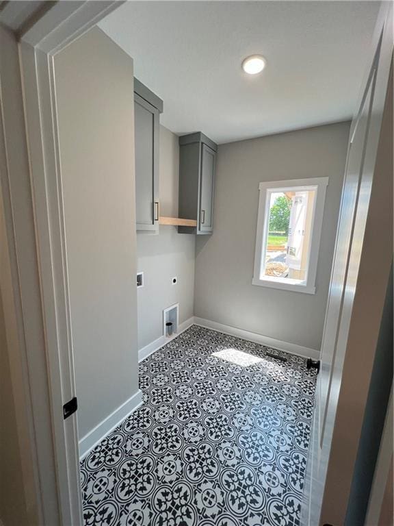 2209 W 176th Pl, Overland Park, KS 66085 - washroom featuring hookup for an electric dryer and cabinet space