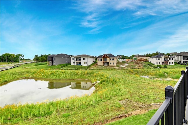 24909 W 98th Pl, Lenexa, KS 66227 - rear view of property with a residential view and a water view