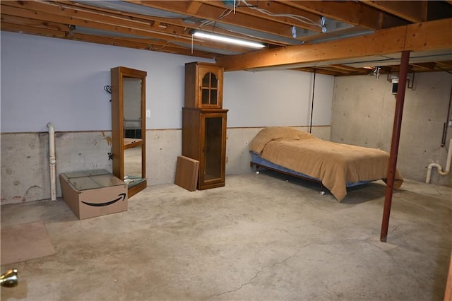 bedroom with concrete flooring