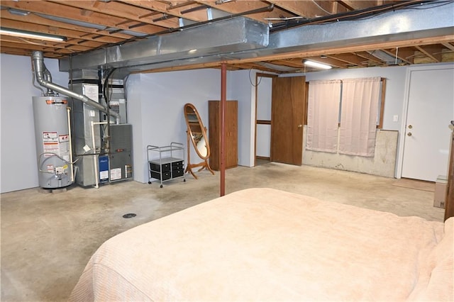 basement with heating unit and gas water heater