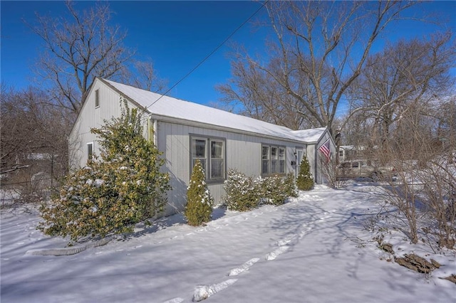 view of snow covered property