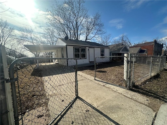 view of front of home featuring a carport