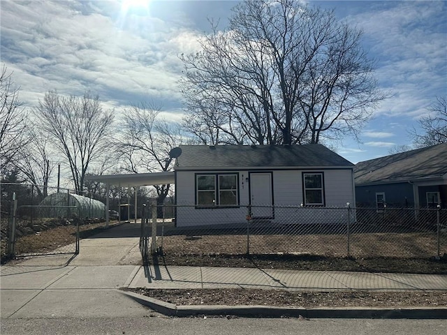 view of front facade with a carport