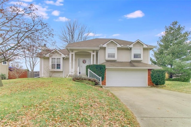 view of front of property with a garage and a front yard