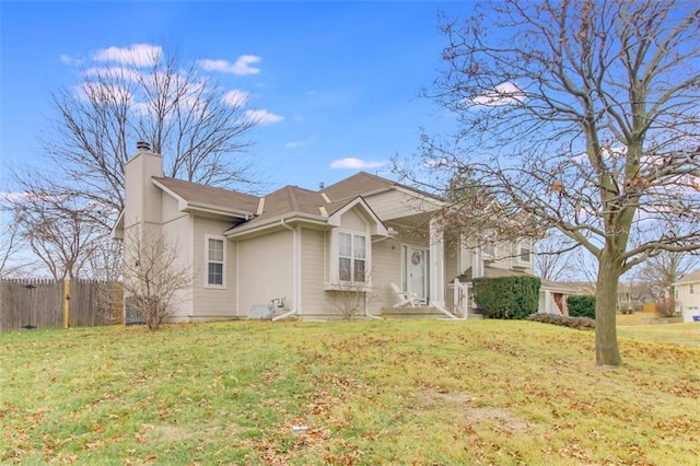 view of front facade with a front lawn