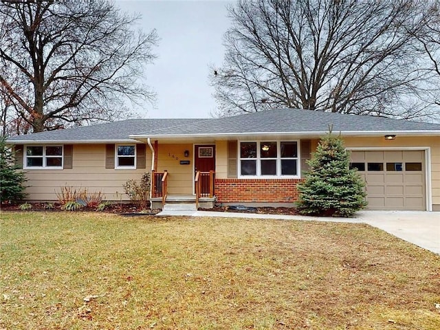 ranch-style home with a garage and a front yard