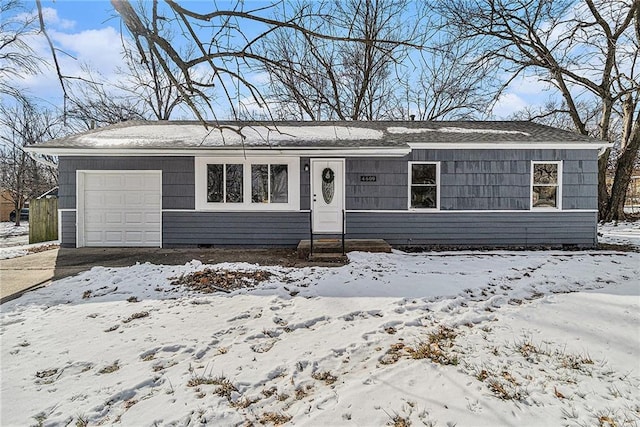 single story home with a garage