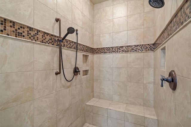 full bathroom featuring a tile shower