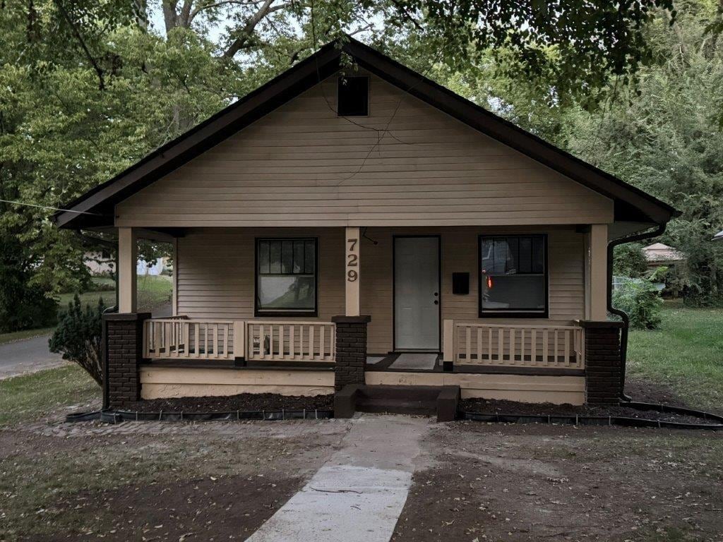 bungalow-style home with a porch