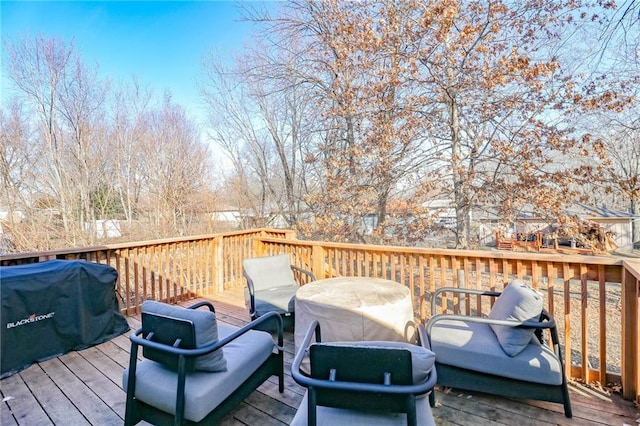 wooden deck with area for grilling