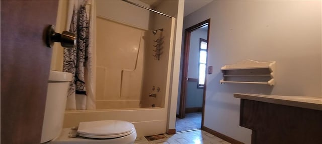 full bathroom with shower / tub combo, vanity, and toilet