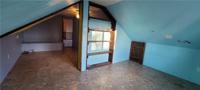 bonus room with vaulted ceiling