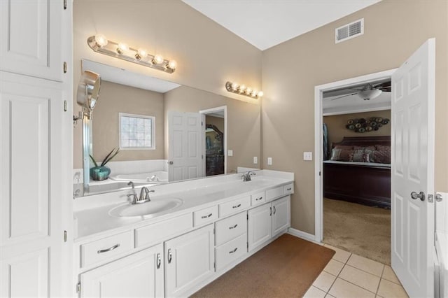 full bathroom with a bath, tile patterned flooring, a sink, and visible vents