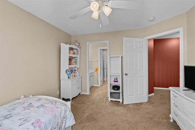 bedroom featuring light carpet, ceiling fan, and baseboards