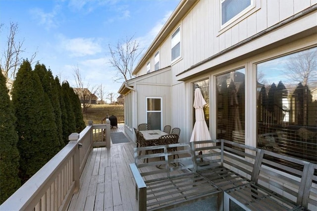 deck featuring outdoor dining space