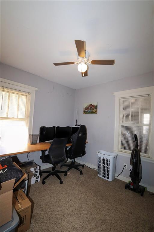 view of carpeted home office