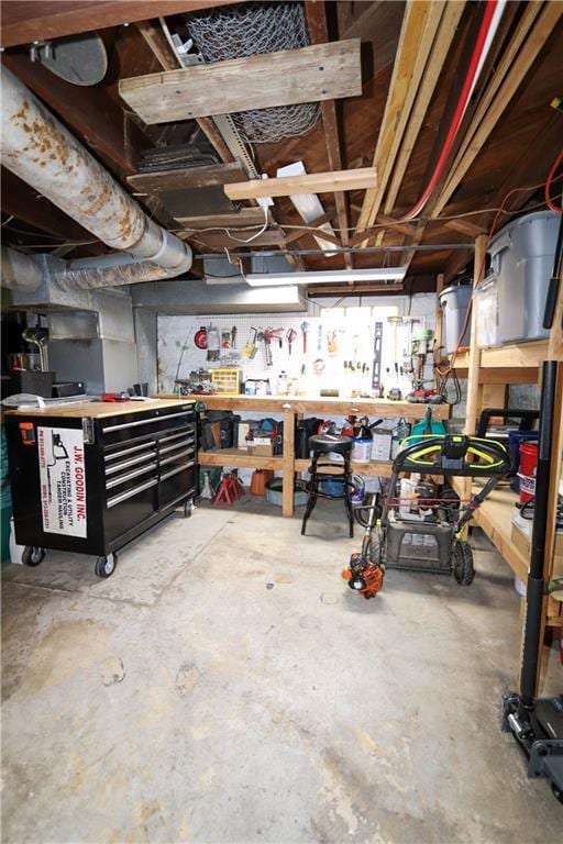 basement with a workshop area