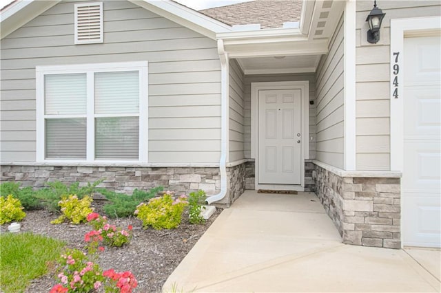 entrance to property with a garage