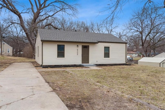 bungalow with a front yard