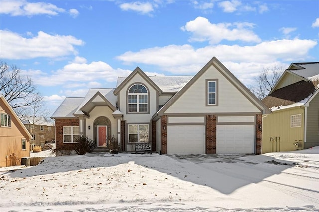 front facade with a garage