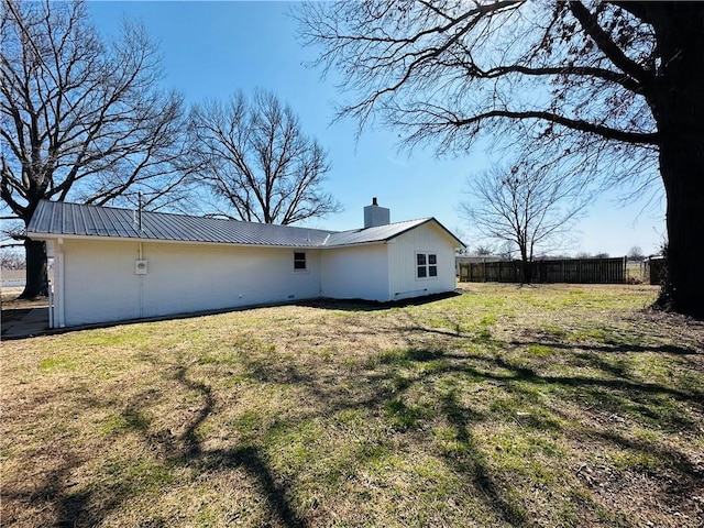 305 N Free King Hwy, Pittsburg, KS 66762 - back of house with a chimney and metal roof