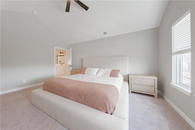 bedroom featuring baseboards, visible vents, a ceiling fan, lofted ceiling, and carpet flooring