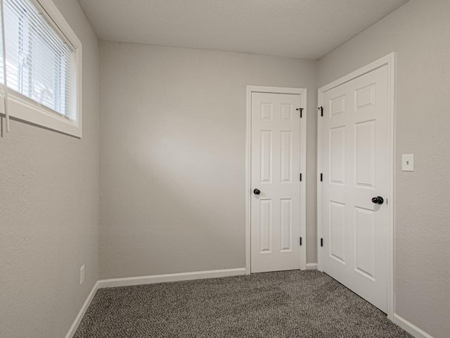 spare room with carpet flooring