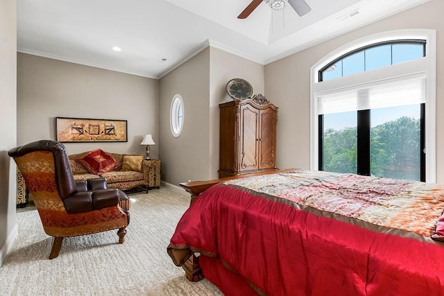 carpeted bedroom with baseboards, multiple windows, ornamental molding, and ceiling fan