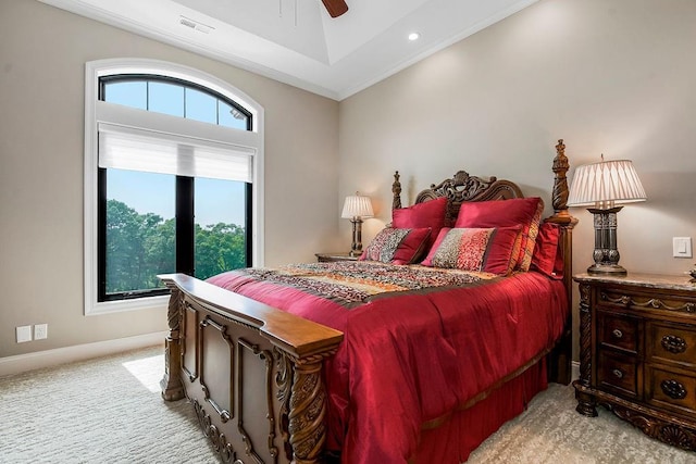 bedroom with baseboards, a ceiling fan, visible vents, and light colored carpet