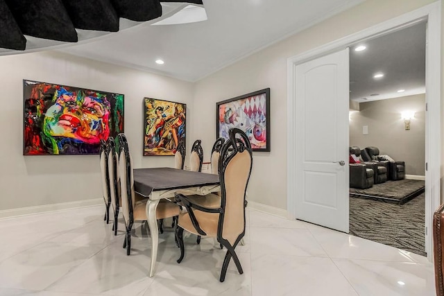 dining room featuring recessed lighting and baseboards