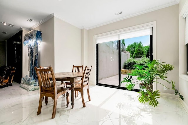 dining space featuring marble finish floor, visible vents, crown molding, and baseboards