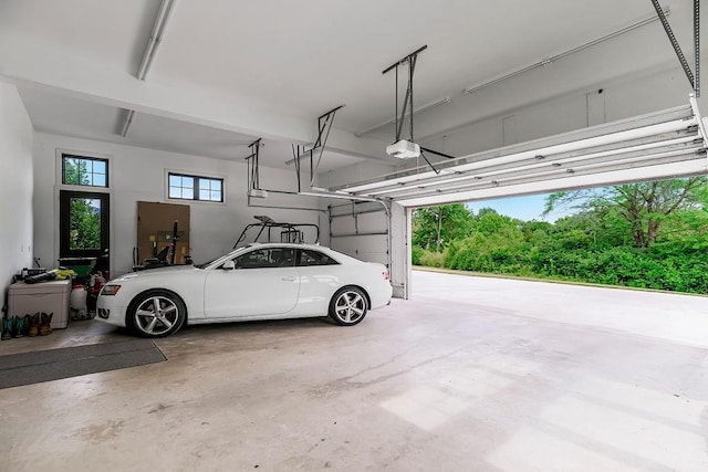 garage featuring a garage door opener